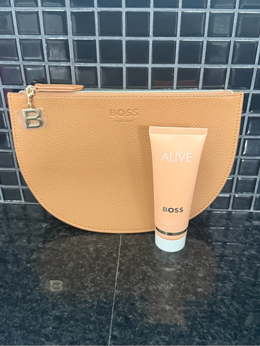 Boss beauty pouch & hand/body cream
